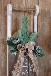 Vintage sledge for deco with spruce & ribbon